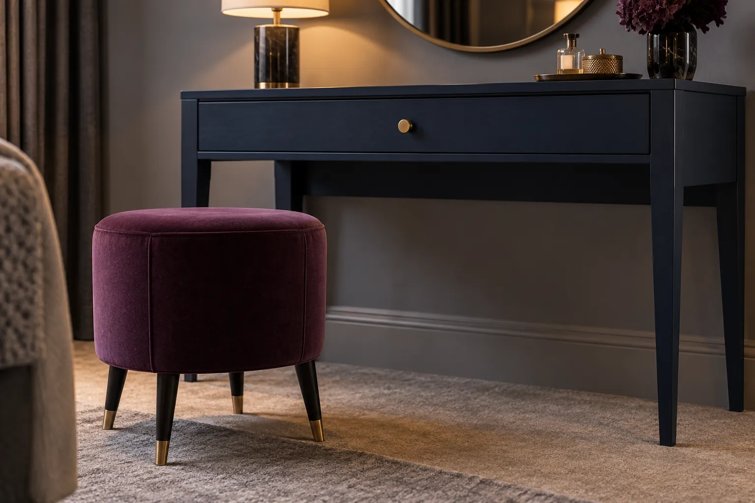 Side view of navy vanity and plum stool showing knee space